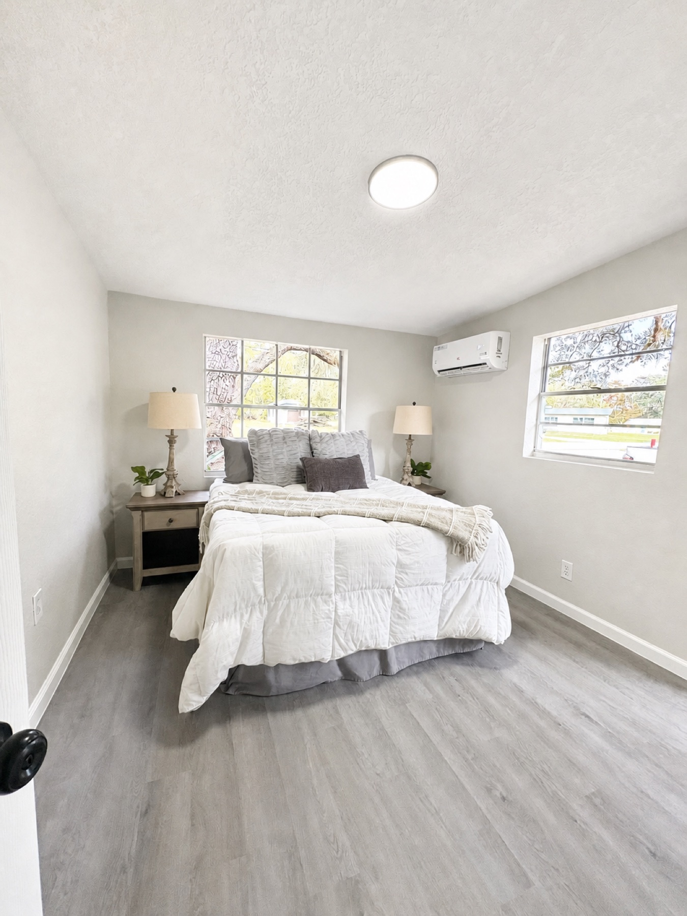 Freshly styled bright neutral bedroom