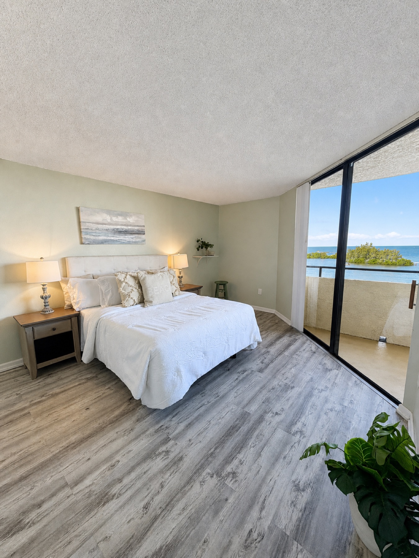 Staged bedroom overlooking the water